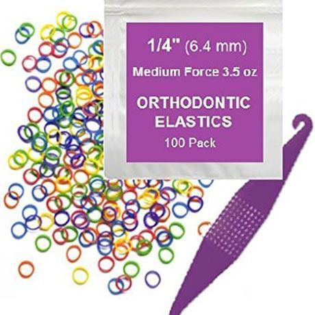 Package of orthodontic elastics with colorful rubber bands and a purple applicator tool