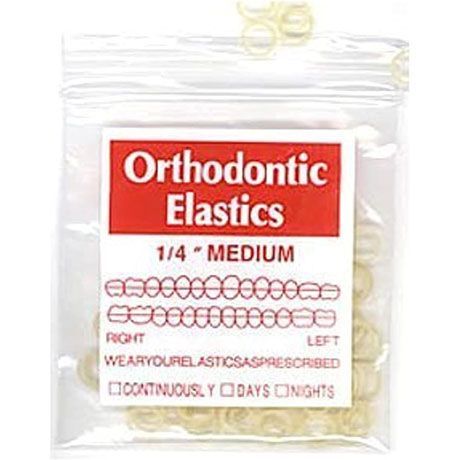 Clear bag of orthodontic elastics labeled “1/4 Medium” in red and white packaging
