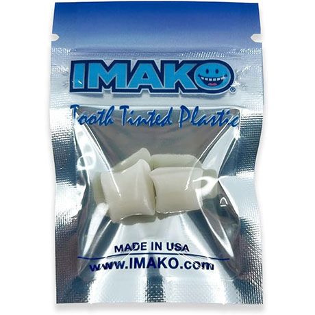IMAKO Turtle Teeth Plugs in silver pouch, two white dental-shaped pieces visible