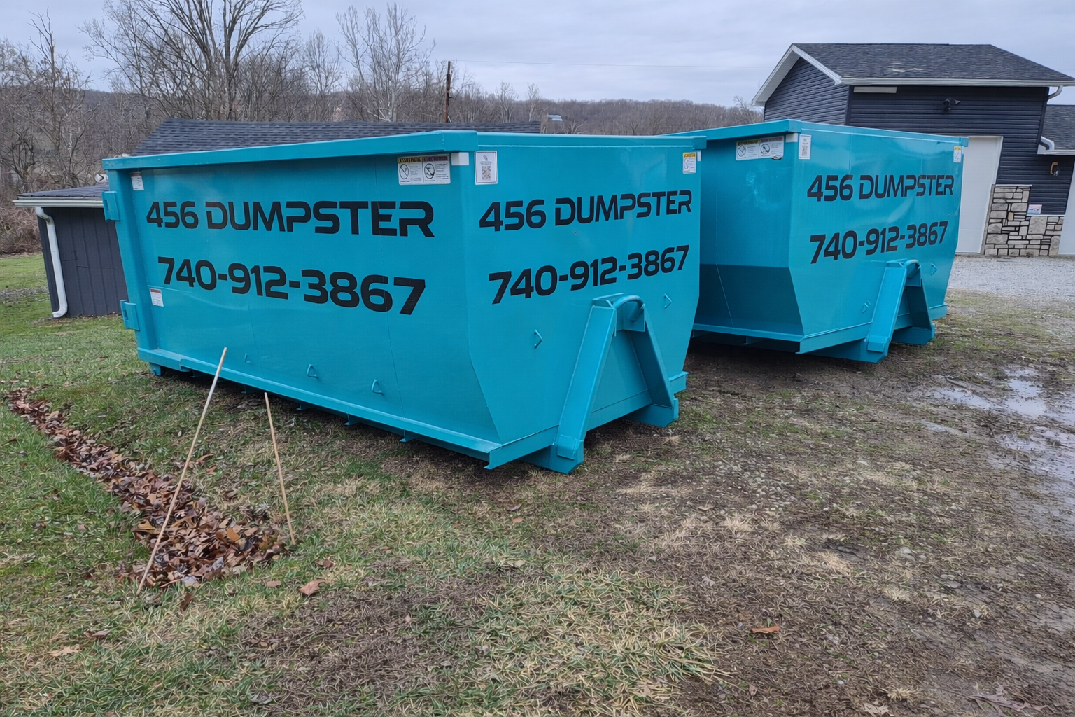 456 Dumpster branded roll-off truck on the road in southern Ohio