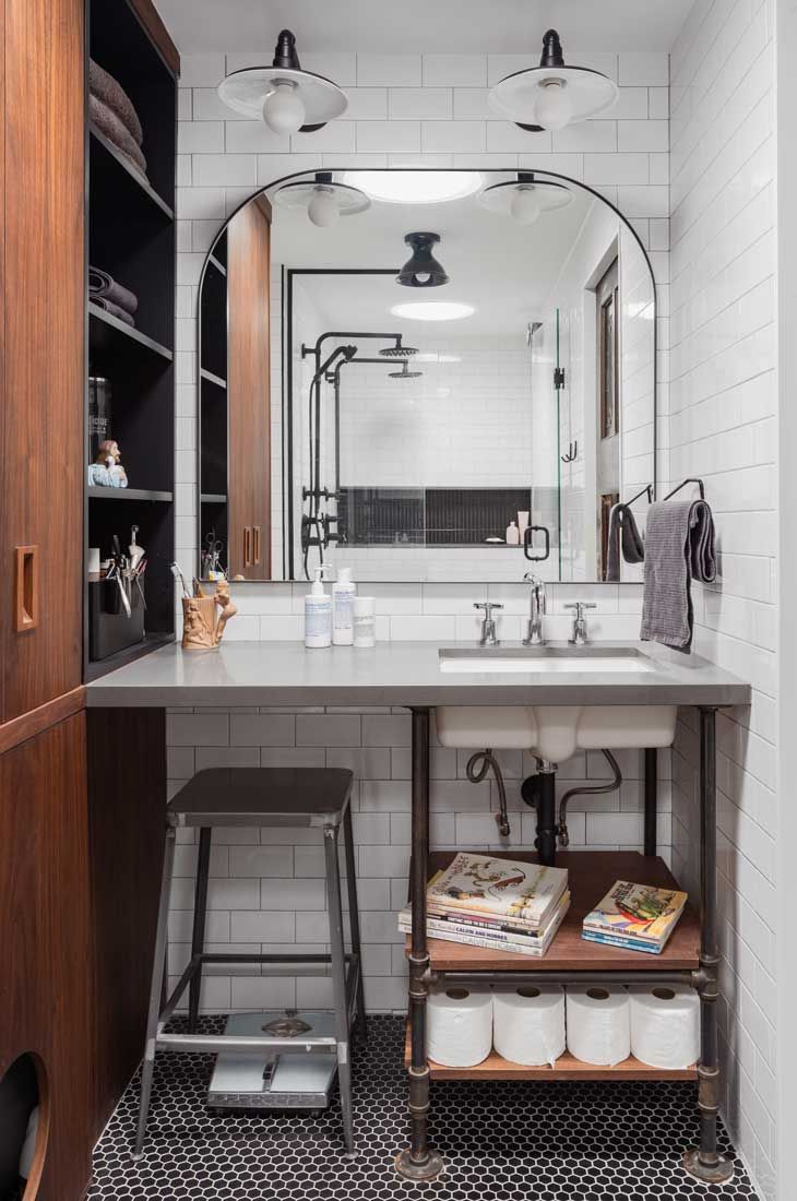 A large window with a wooden frame is open to a kitchen.