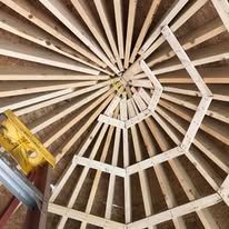 Looking up at the ceiling of a building under construction.