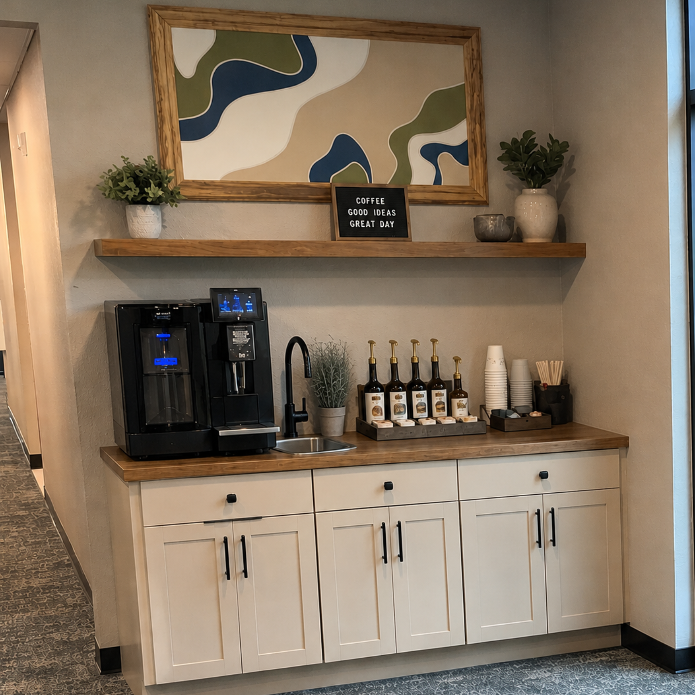 Coffee bar with an automatic coffee machine and syrups with abstract art