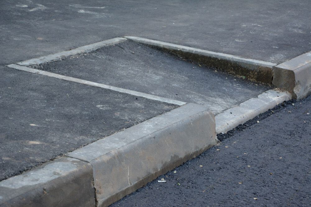 There Is A Ramp In The Middle Of A Parking Lot — Flash Concreting Pty Ltd In Bowen, QLD