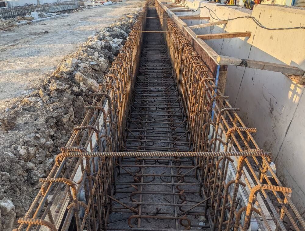 A Construction Site With A Lot Of Steel Bars In The Ground — Flash Concreting Pty Ltd In Nindaroo, QLD
