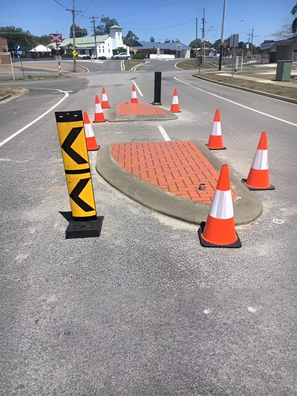 A Bunch Of Orange And White Traffic Cones — Flash Concreting Pty Ltd In Bowen, QLD
