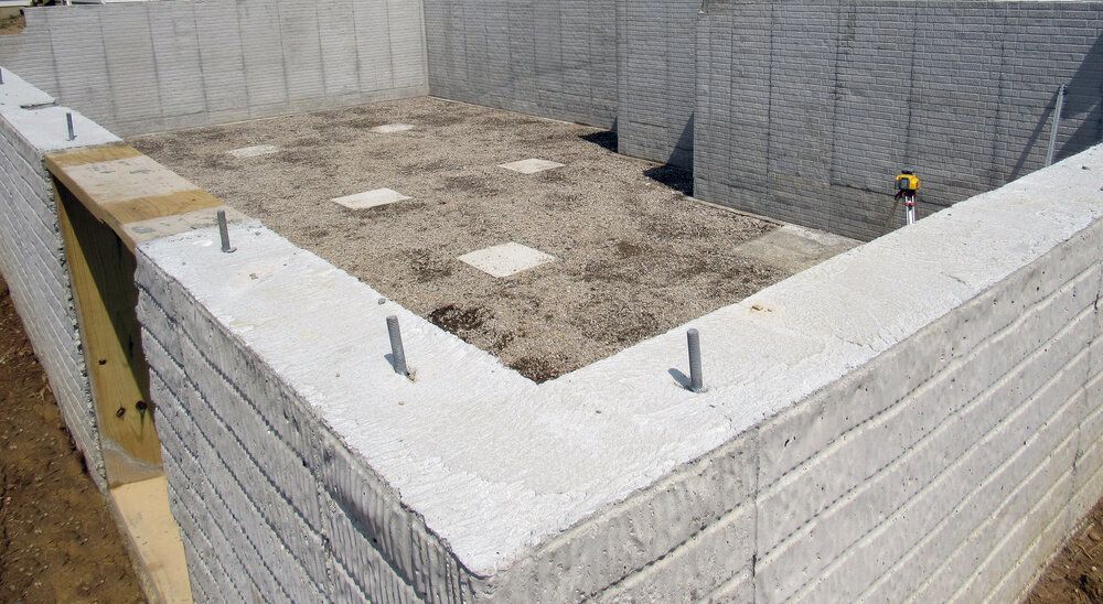 A Concrete Wall Is Being Built In A Basement — Flash Concreting Pty Ltd In Nindaroo, QLD