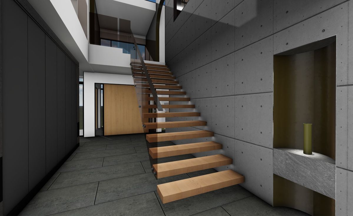 A hallway with a wooden staircase and a concrete wall