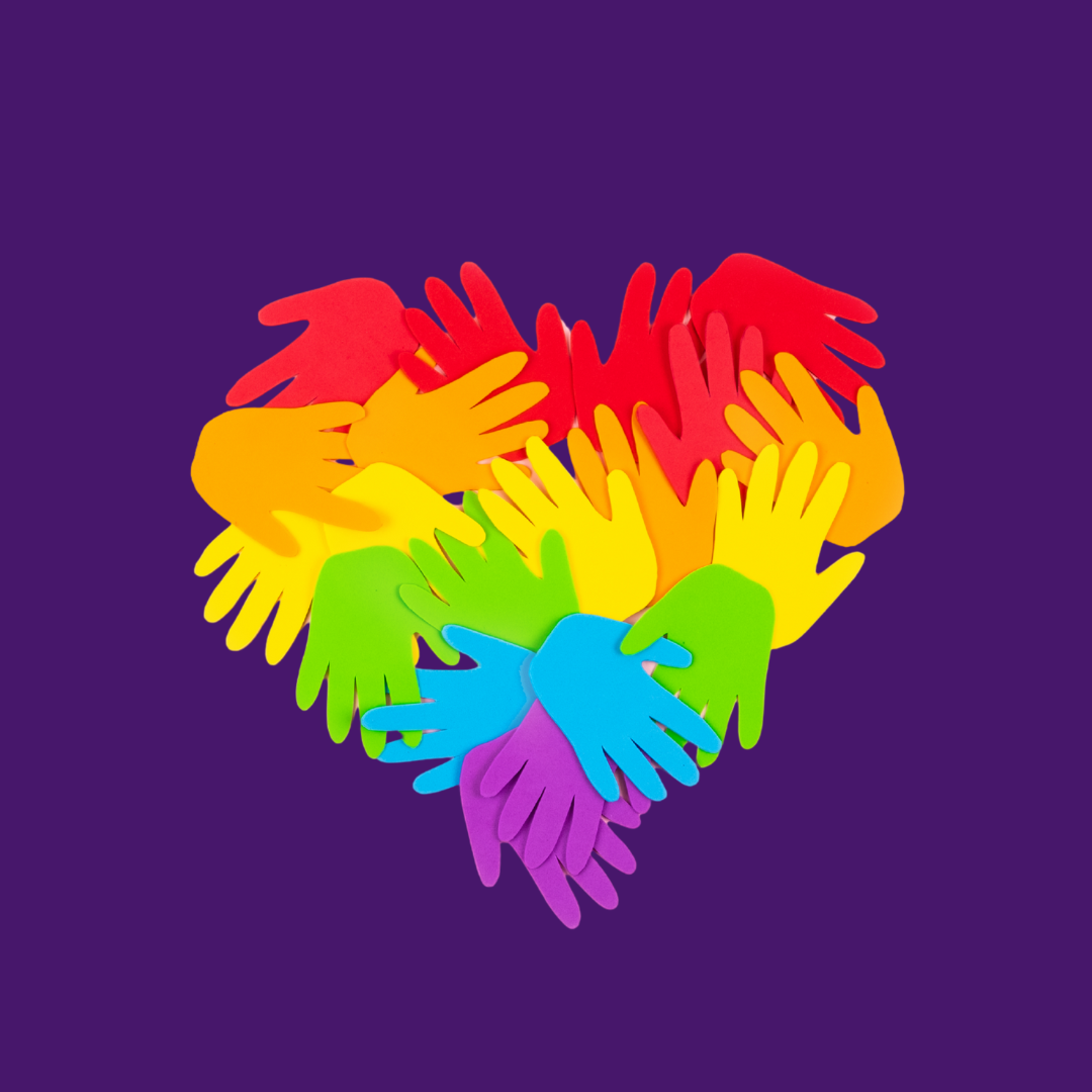 Rainbow-colored hands forming a heart shape on a purple background.