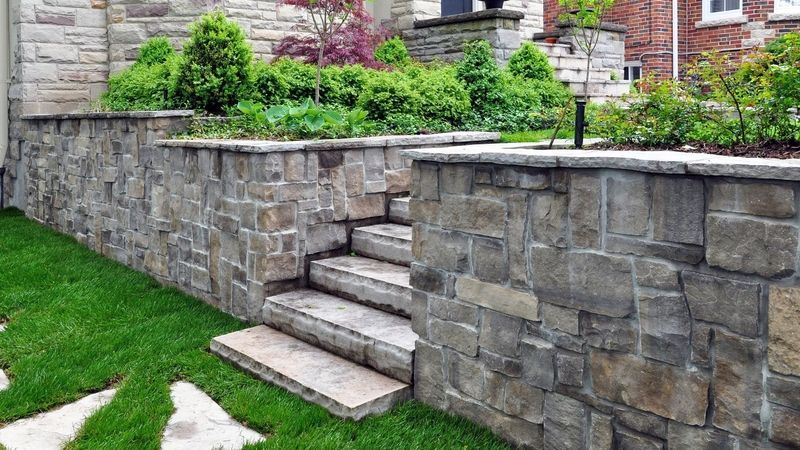 This stone retaining wall is maintained by our experienced stone masons.