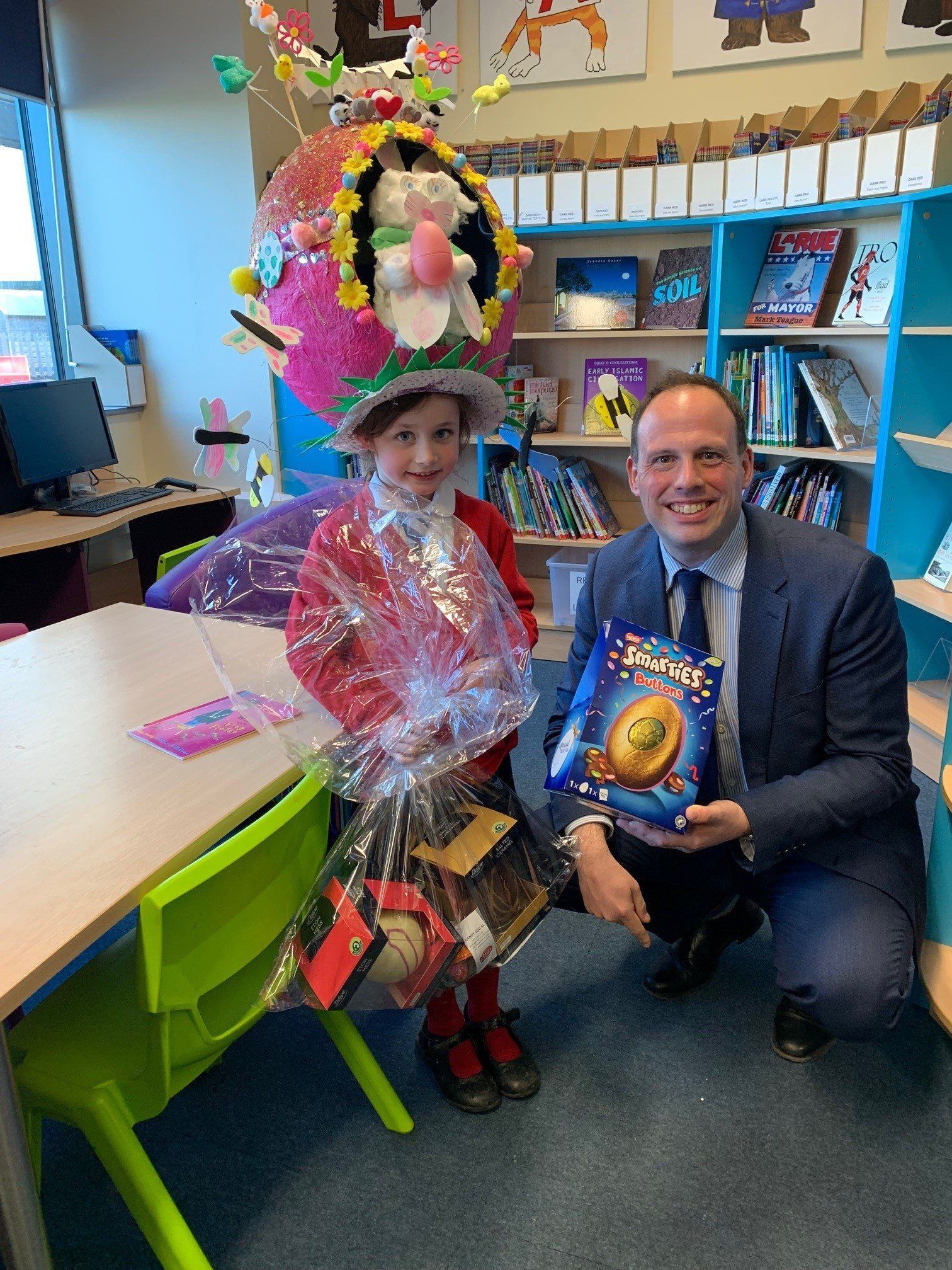 The winner of the Easter bonnet competition with Buckingham MP Greg Smith