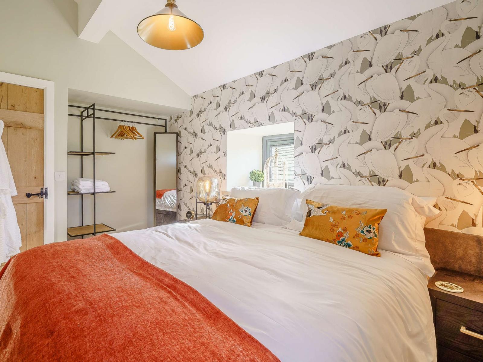 Beautiful bedroom with lovey bird wall paper