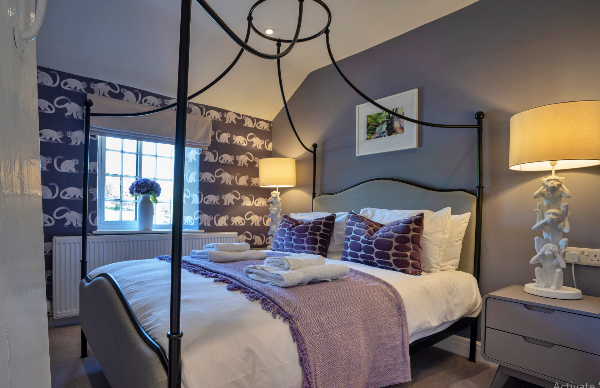 Limestone Cottage - Second bedroom with beautiful frame bed