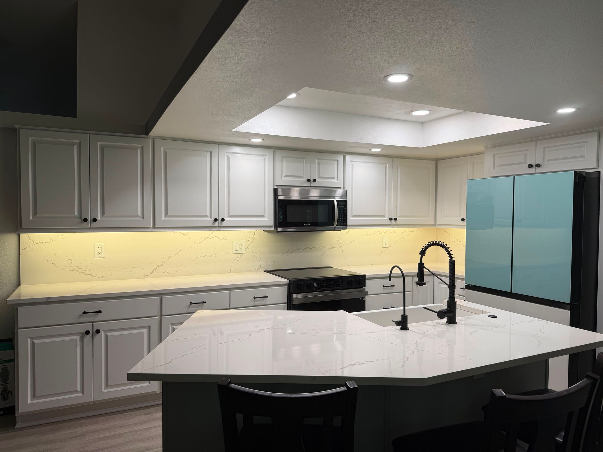 Interior of a home lit by modern outdoor lighting — example of residential electrical work