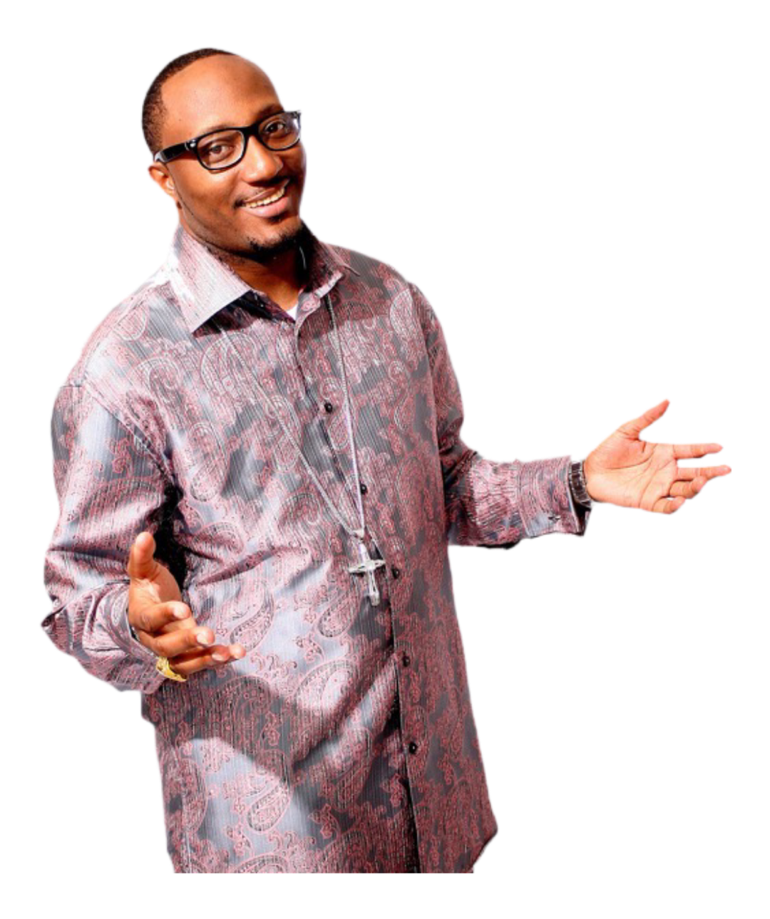 A man wearing glasses and a purple shirt is standing with his arms outstretched.