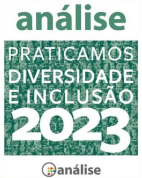 A green and white sign that says `` praticamos diversidade e inclusão ''.