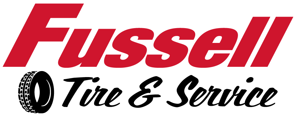 Fussell Tire & Service logo in red and black with tire graphic
