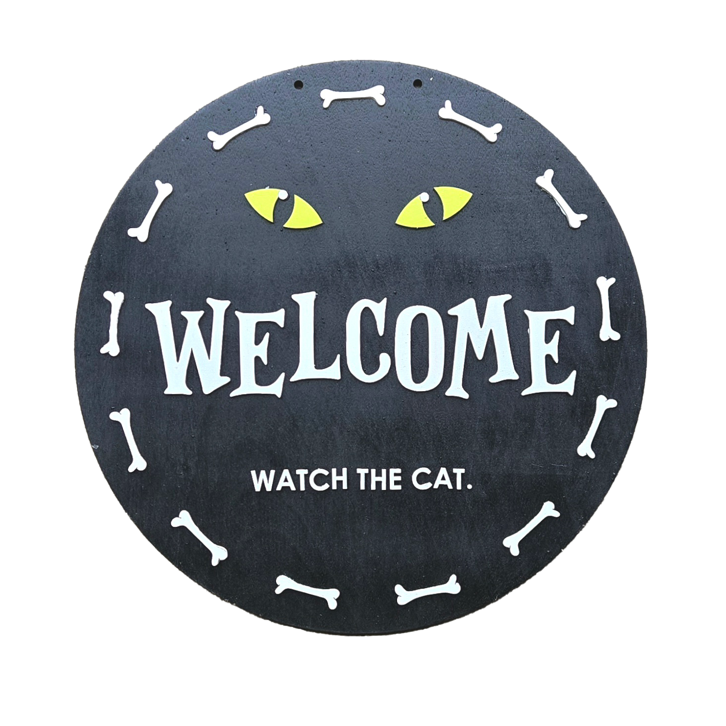 Layered welcome sign with cat eyes, bones, and humorous watch the cat message