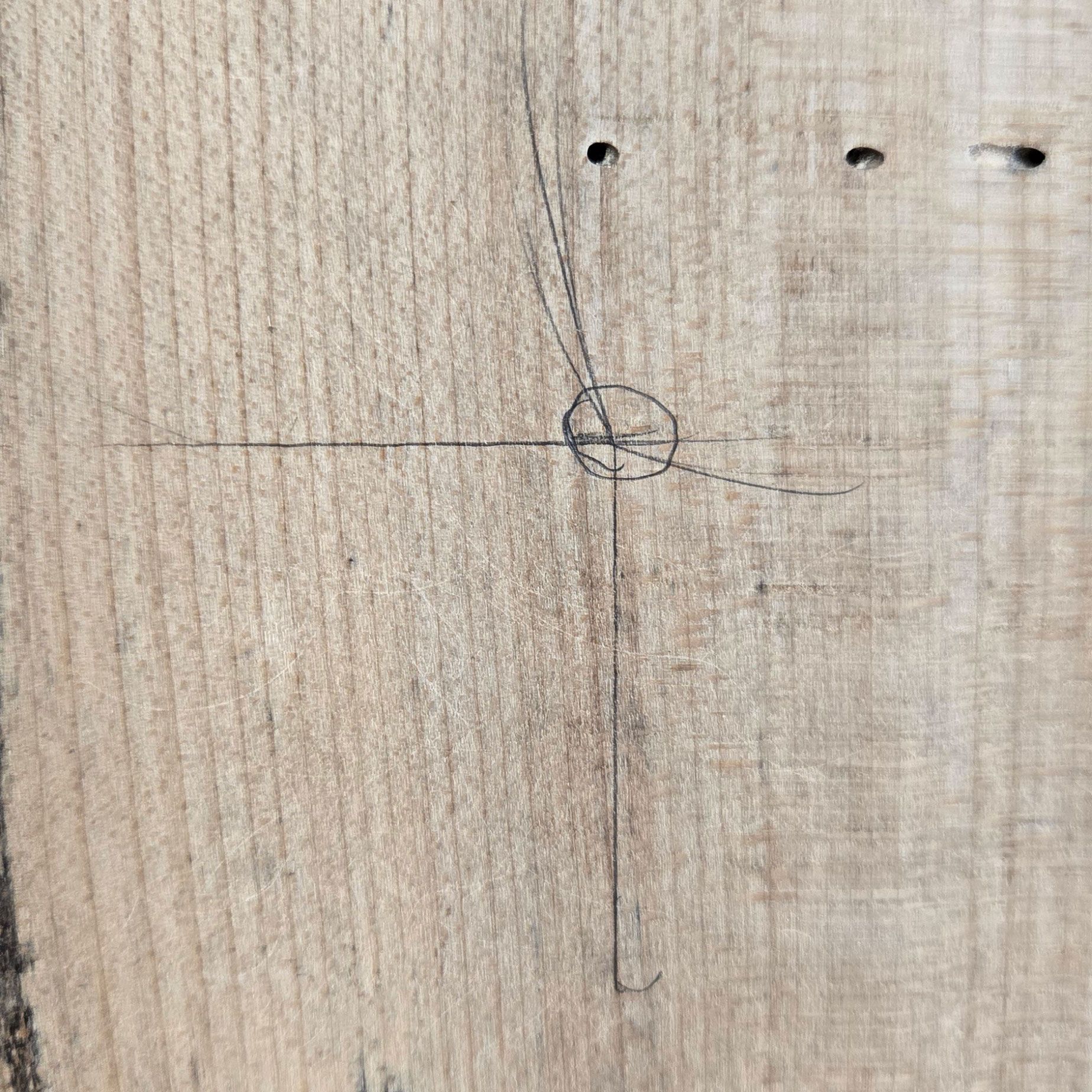 Pencil-drawn registration point on the wood used to align each engraving section accurately with Print & Cut.
