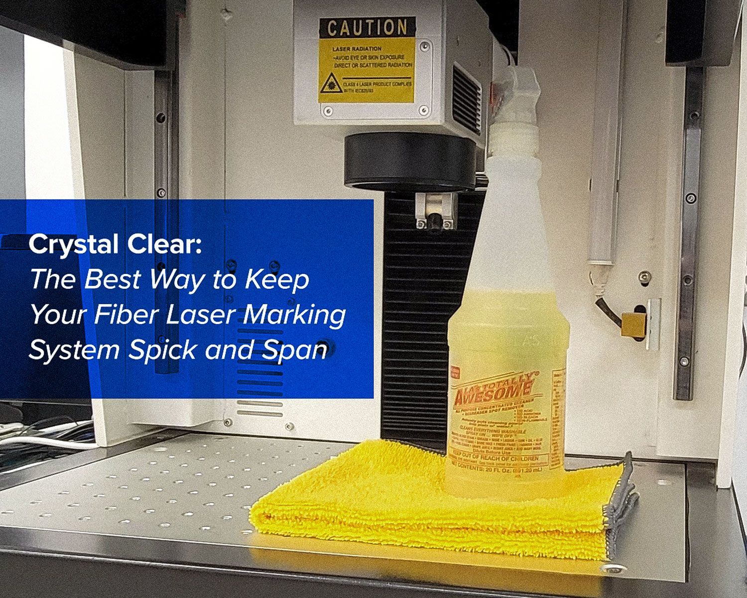 fiber laser machine work area with cleaner and microfiber cloth
