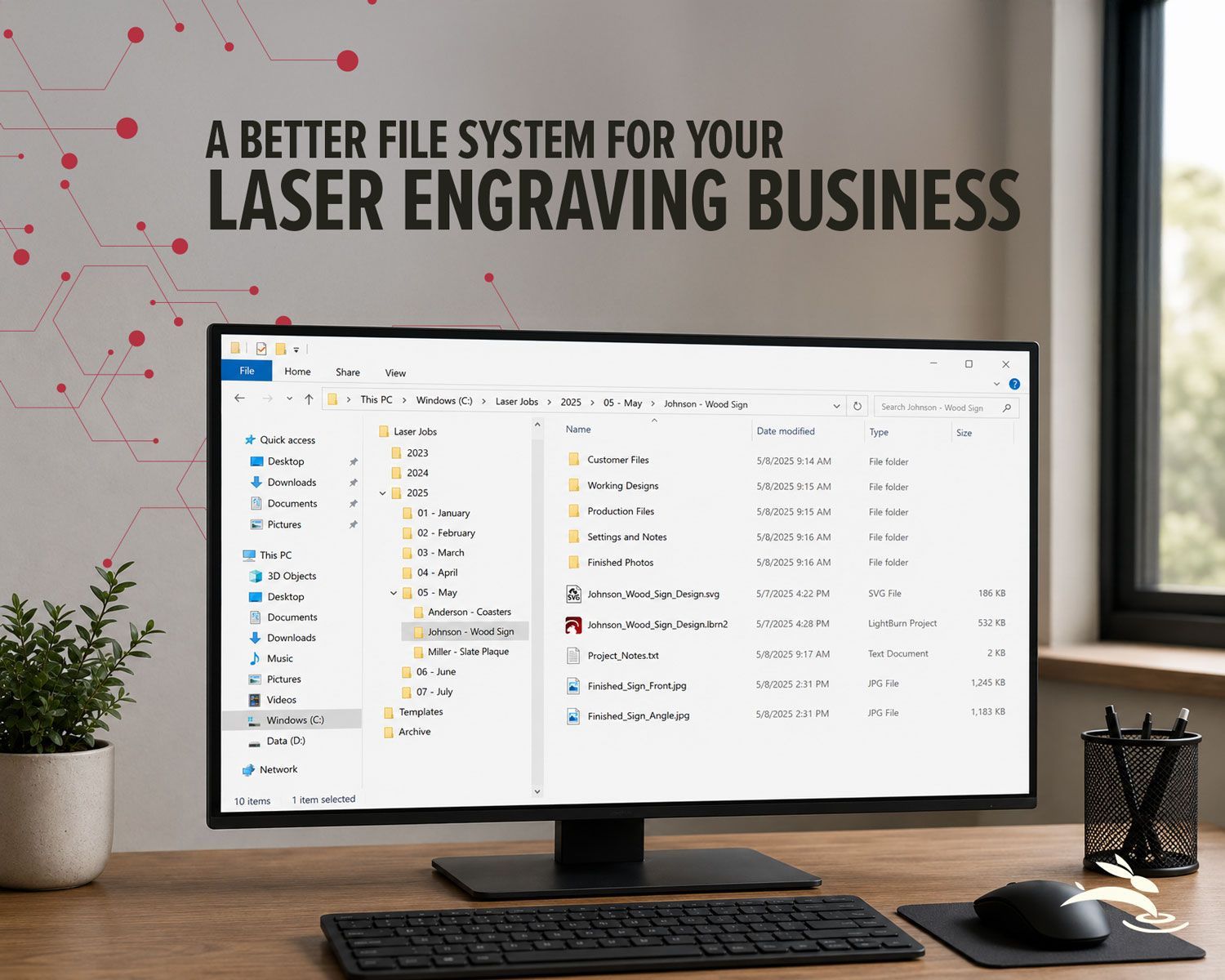 Desktop workspace showing an organized file system for managing laser engraving business projects.