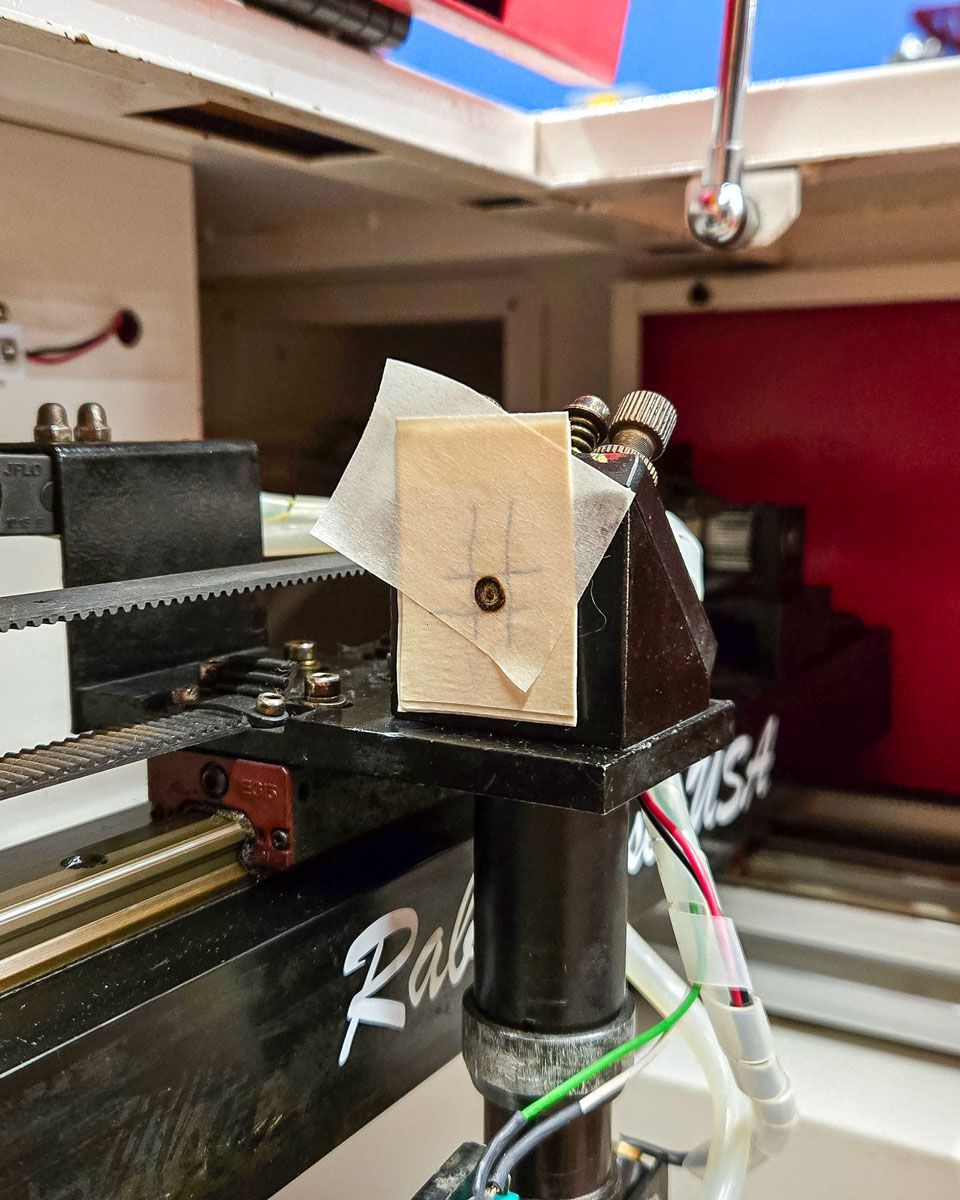 laser beam alignment process with tape and grid for aligning