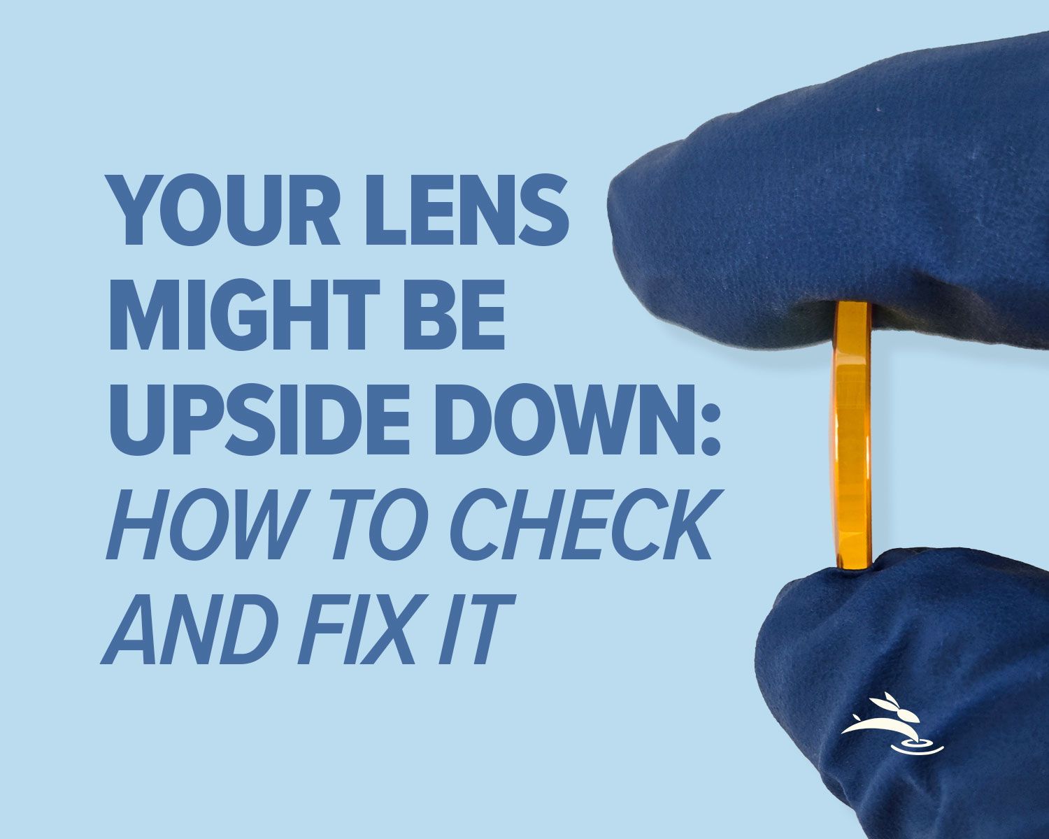 CO2 laser lens held with gloves showing correct orientation, blog cover upside down lenses