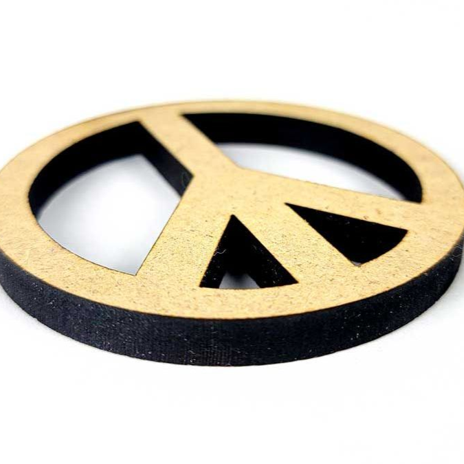 Laser cut mdf peace sign with painted black edge.