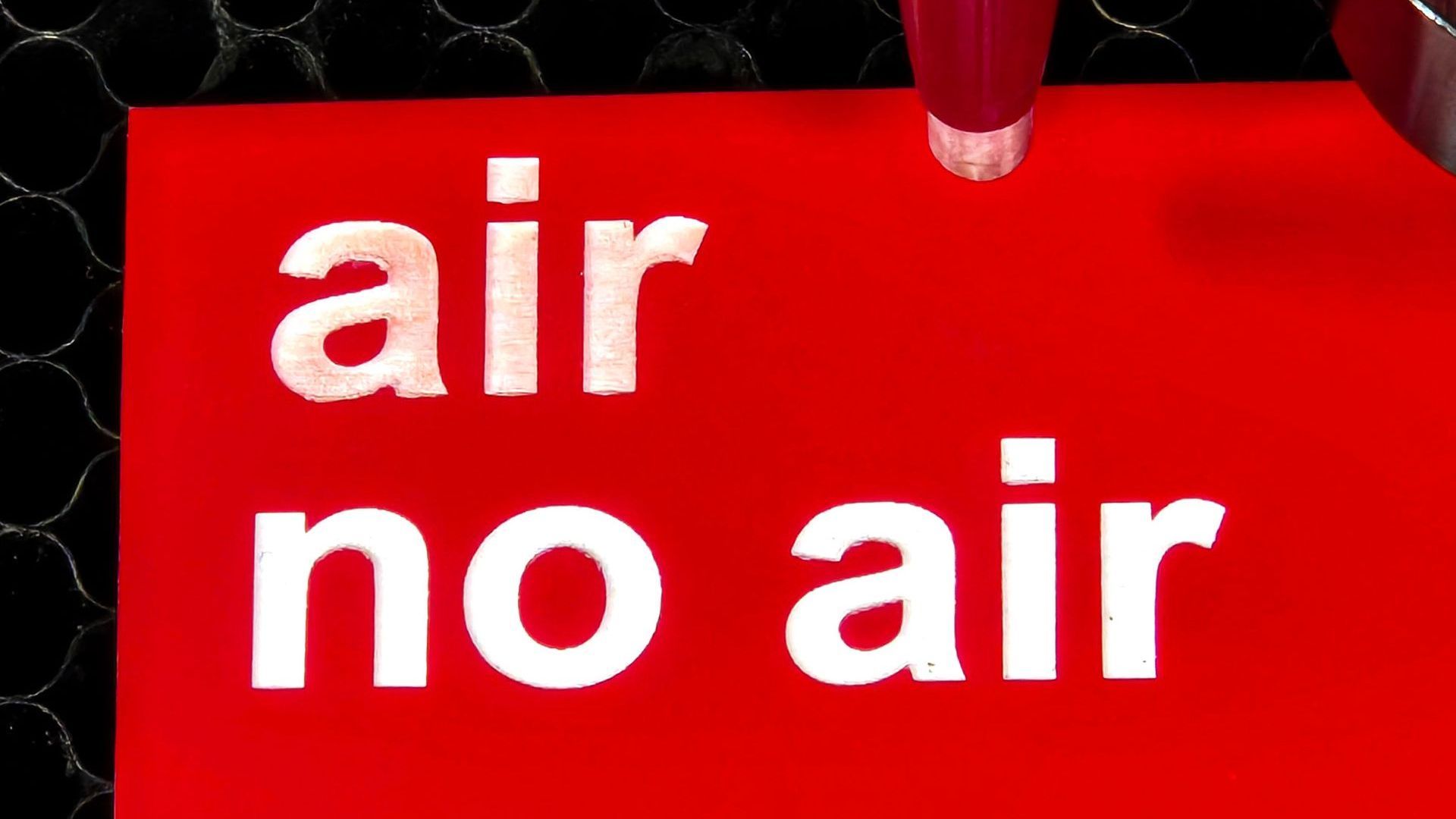 comparison of air and no air laser engraved on multi-ply acrylic