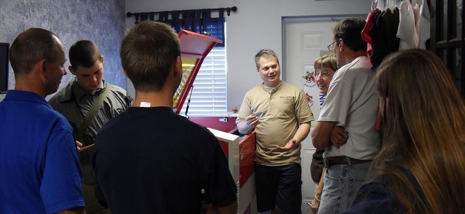 people standing around their new rabbit laser usa machine
