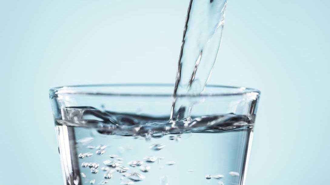 water being poured into a glass