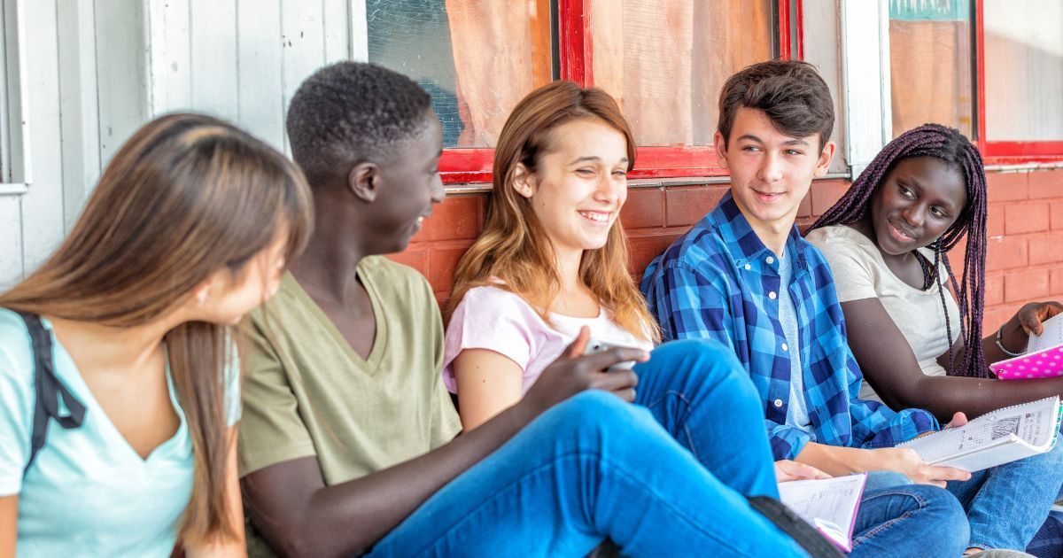 a group of young people at study hall talking in St. Louis, MO
