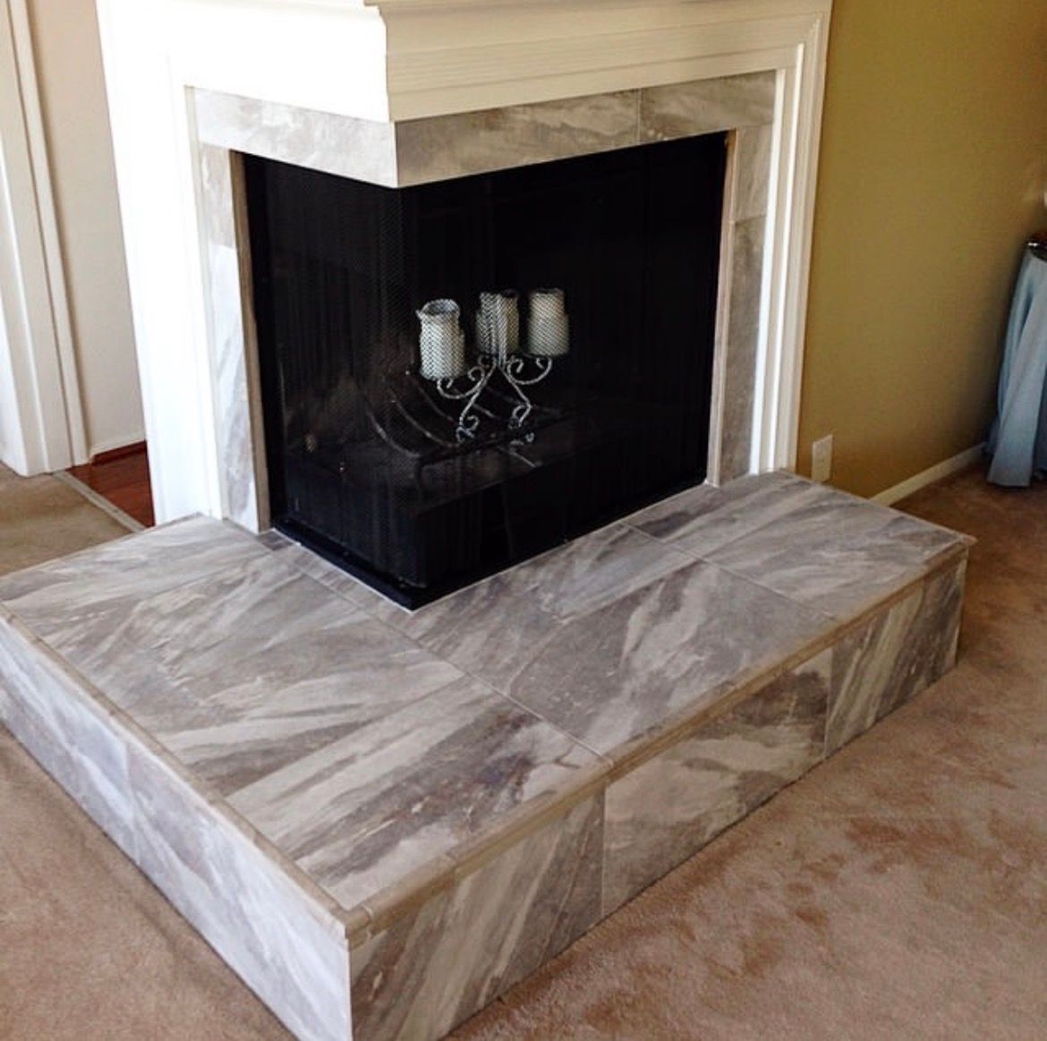 Fireplace with marble surround and hearth.