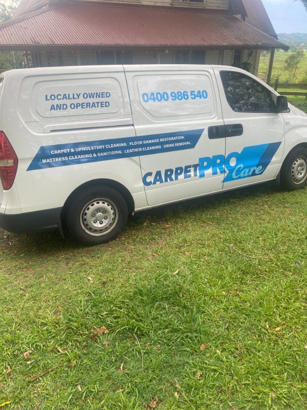 A White Van is Parked in Front of a House  — Carpet Pro Care in Goonellabah, NSW
