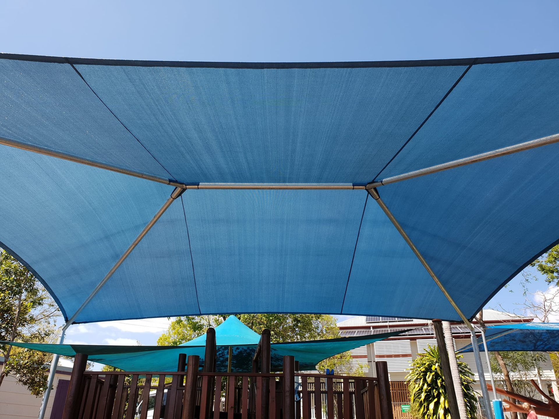 An Aerial View of a Roof With a Shade Sail on It — Cooloola Sail Company In Southside, QLD