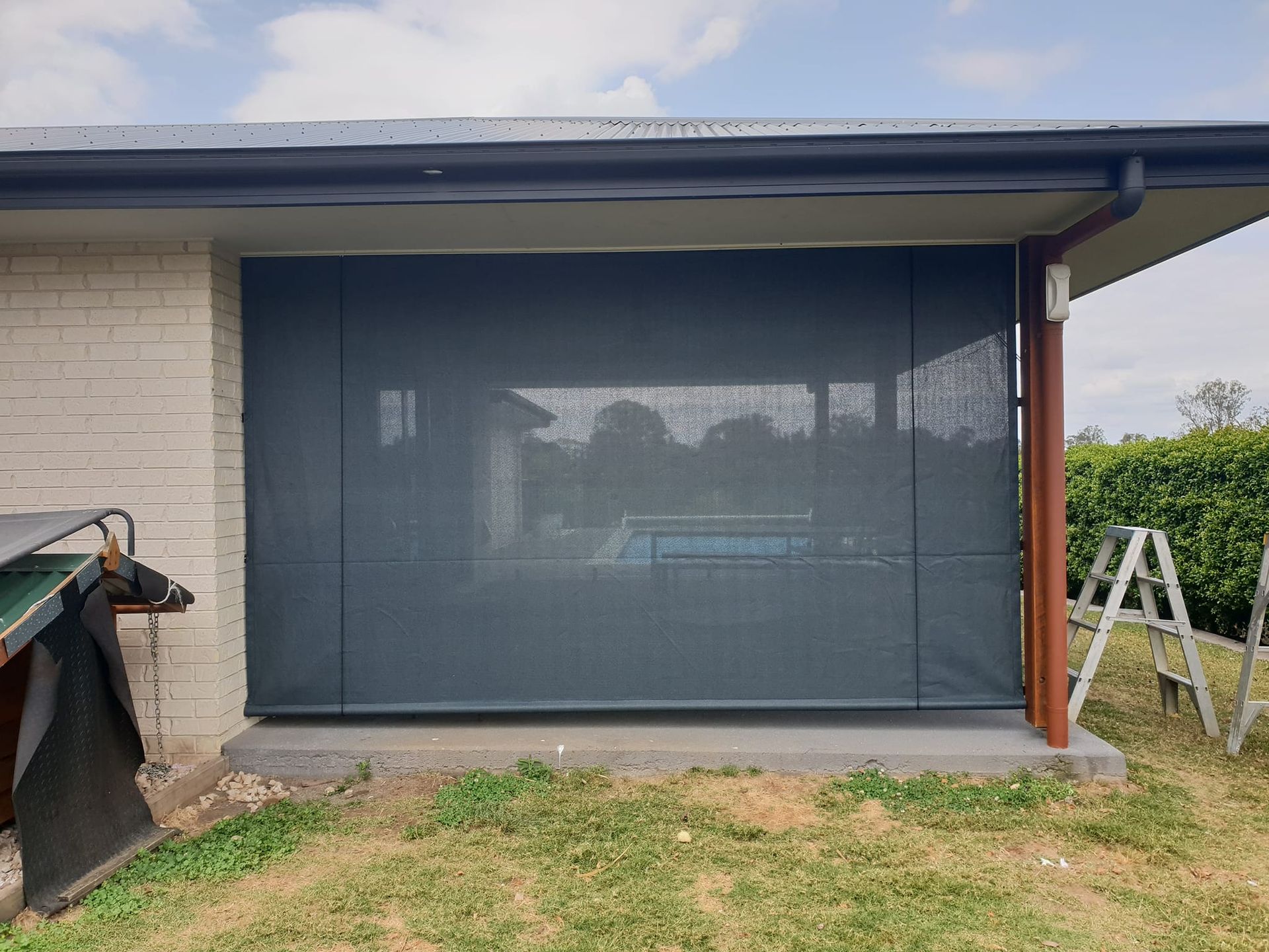 A house with a screen on the side of it — Cooloola Sail Company In Southside, QLD