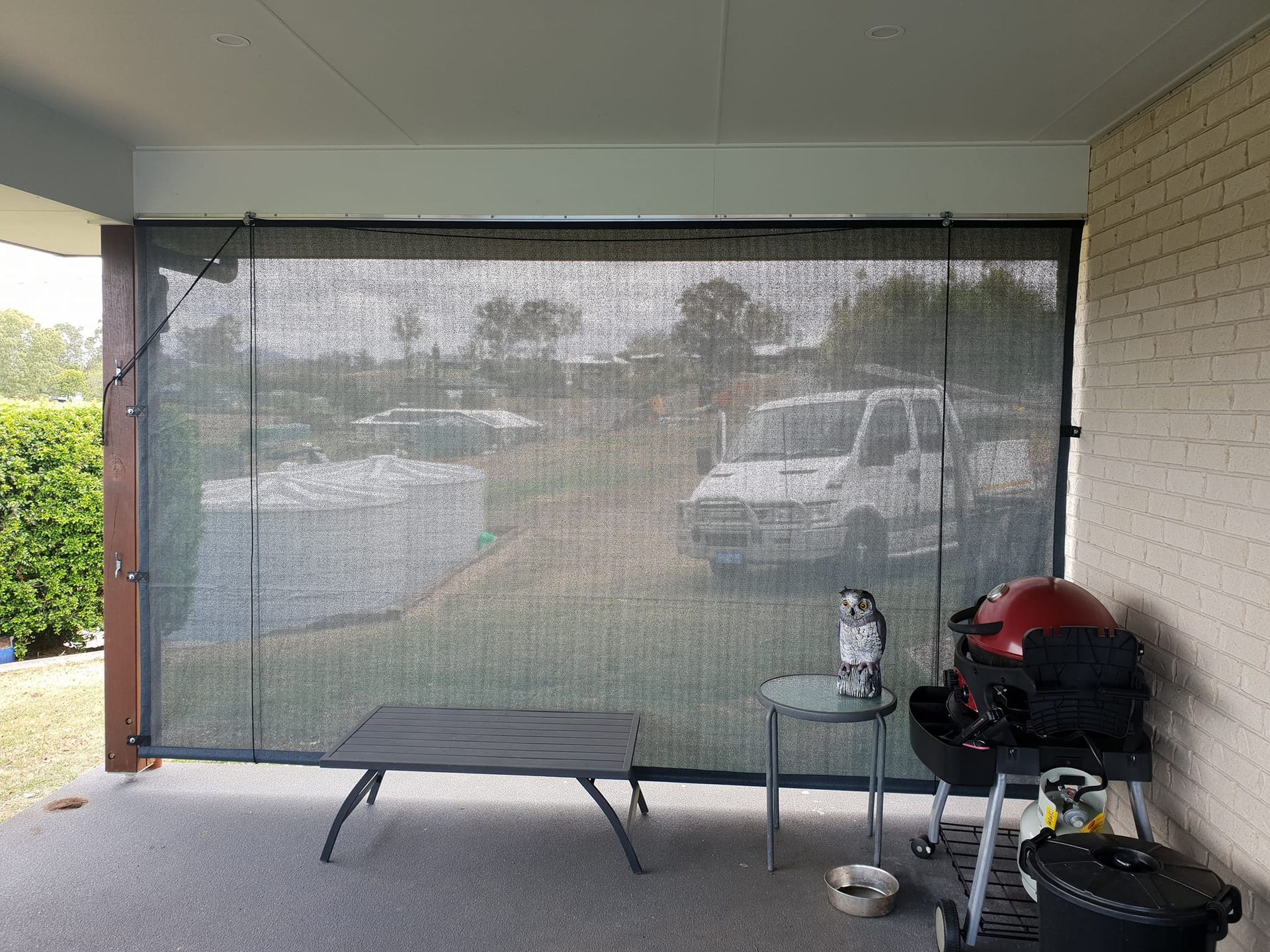 A Patio With a Table , Chairs , and a Grill — Cooloola Sail Company In Eumundi, QLD