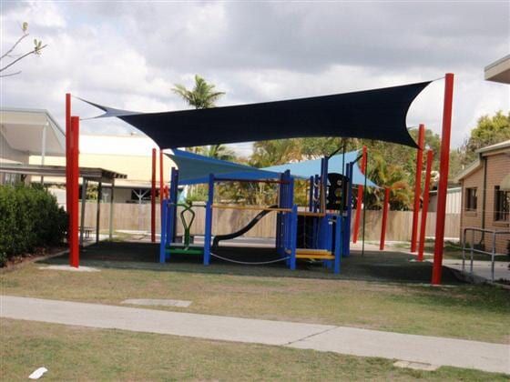 A Playground With a Blue Shade Over It — Cooloola Sail Company In Rainbow Beach, QLD