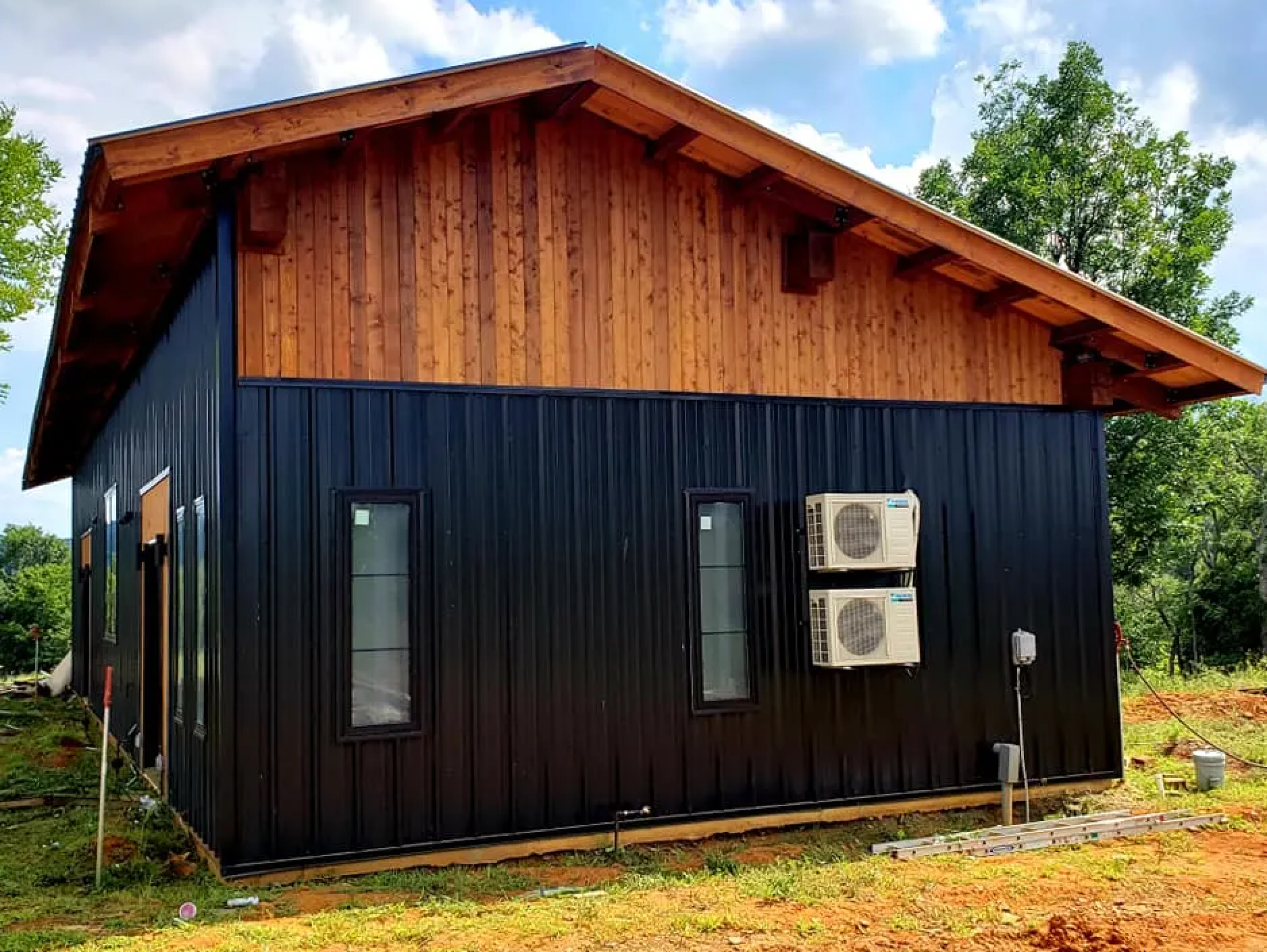 Wood and metal barndominium siding combination