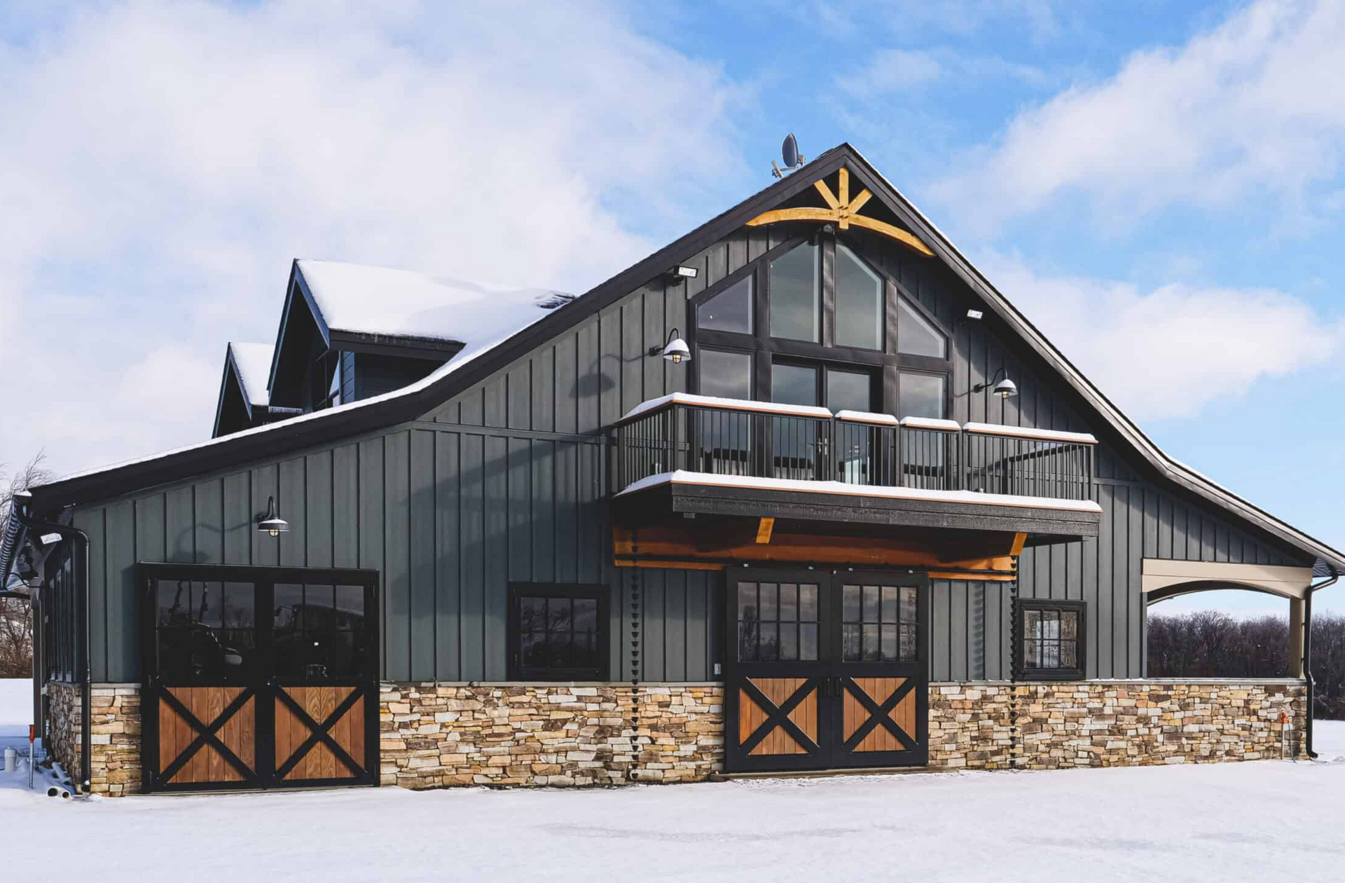 Large barndominium with barn doors and barn-like layout