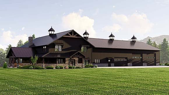 A large house is sitting on top of a lush green field.