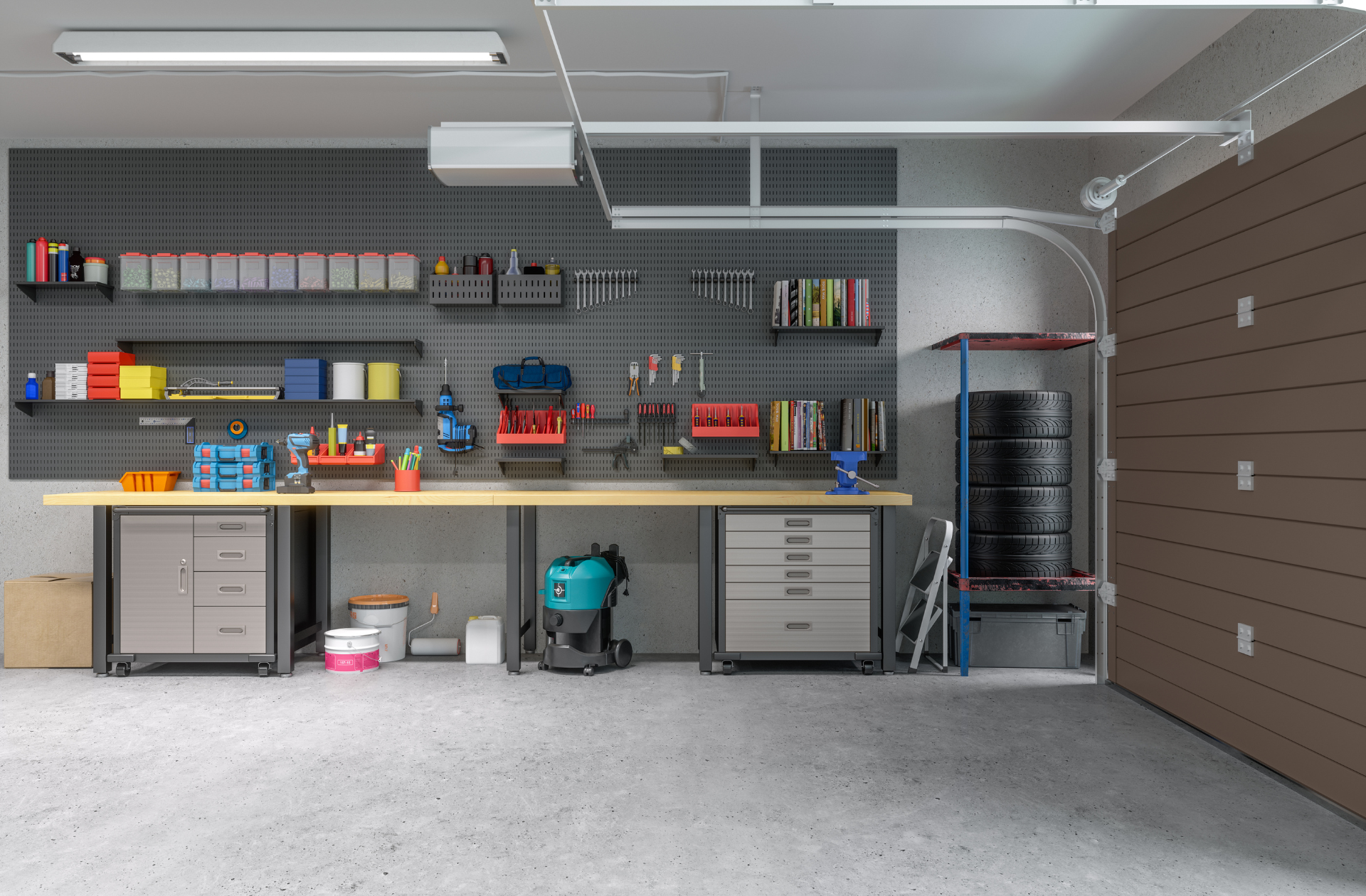 A garage with a workbench and a vacuum cleaner.