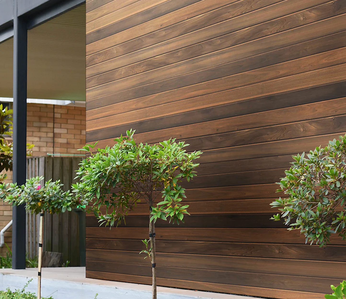 Dark brown wood barndominium siding