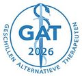 Blue GAT 2026 logo with caduceus symbol and circular text “Geschillen Alternatieve Therapeuten”