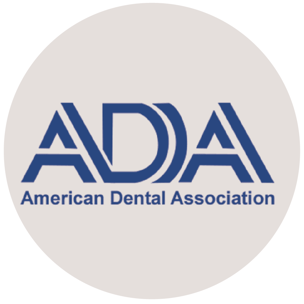 American Dental Association logo in blue on a light gray circle background
