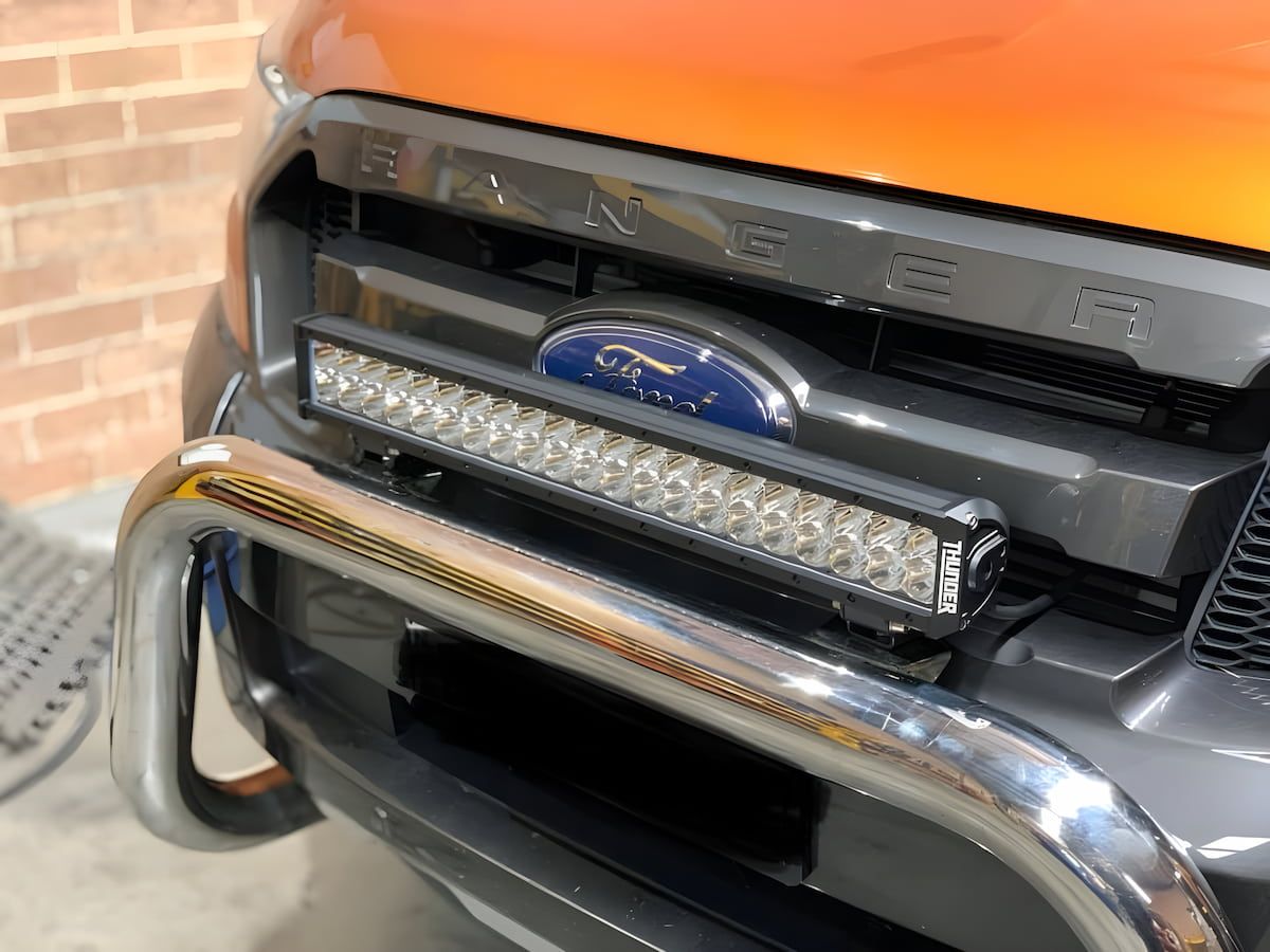 A Close up Of the Front of A Ford Ranger with A Light Bar Attached to It — Bonetig's Mobile Towbars & Trailers In Oak Flats, NSW
