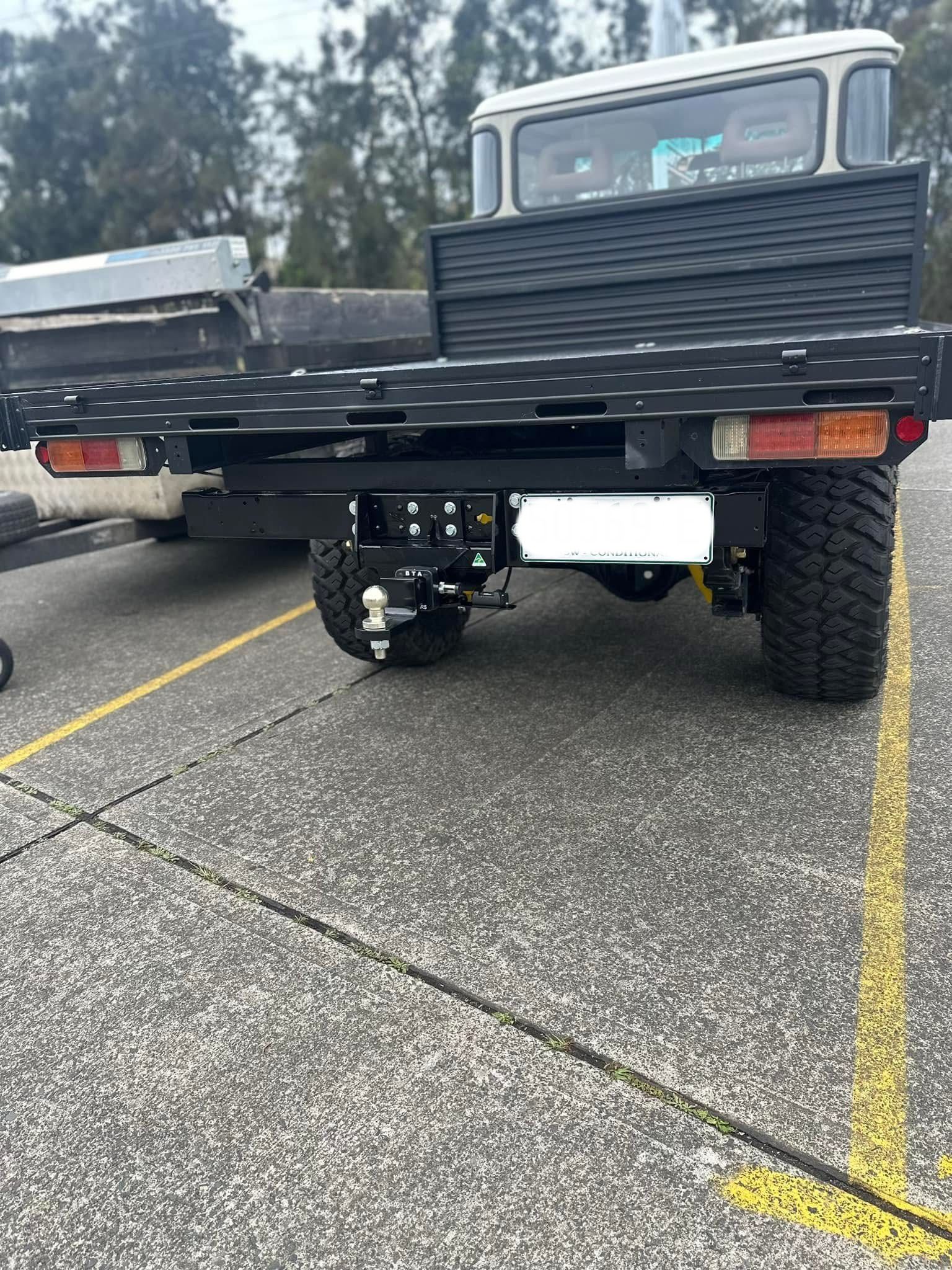 Hayman Reese Trailer Hitches Are Displayed on A Rack — Bonetig's Mobile Towbars & Trailers In Oak Flats, NSW
