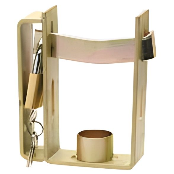 A Metal Item with A Key in It — Bonetig's Mobile Towbars & Trailers In Oak Flats, NSW
