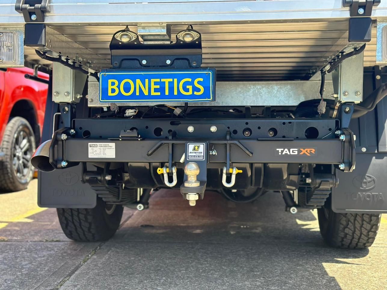 The Back of A Truck with A License Plate that Says Bonetigs — Bonetig's Mobile Towbars & Trailers In Oak Flats, NSW
