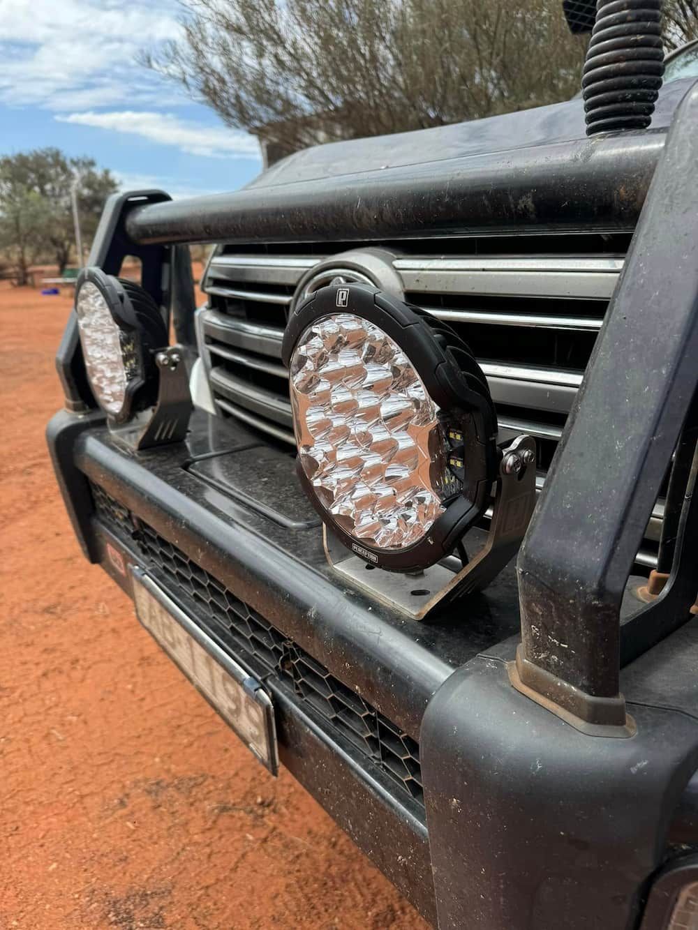 A Close up Of the Front of A Truck with Lights on It — Bonetig's Mobile Towbars & Trailers In Oak Flats, NSW